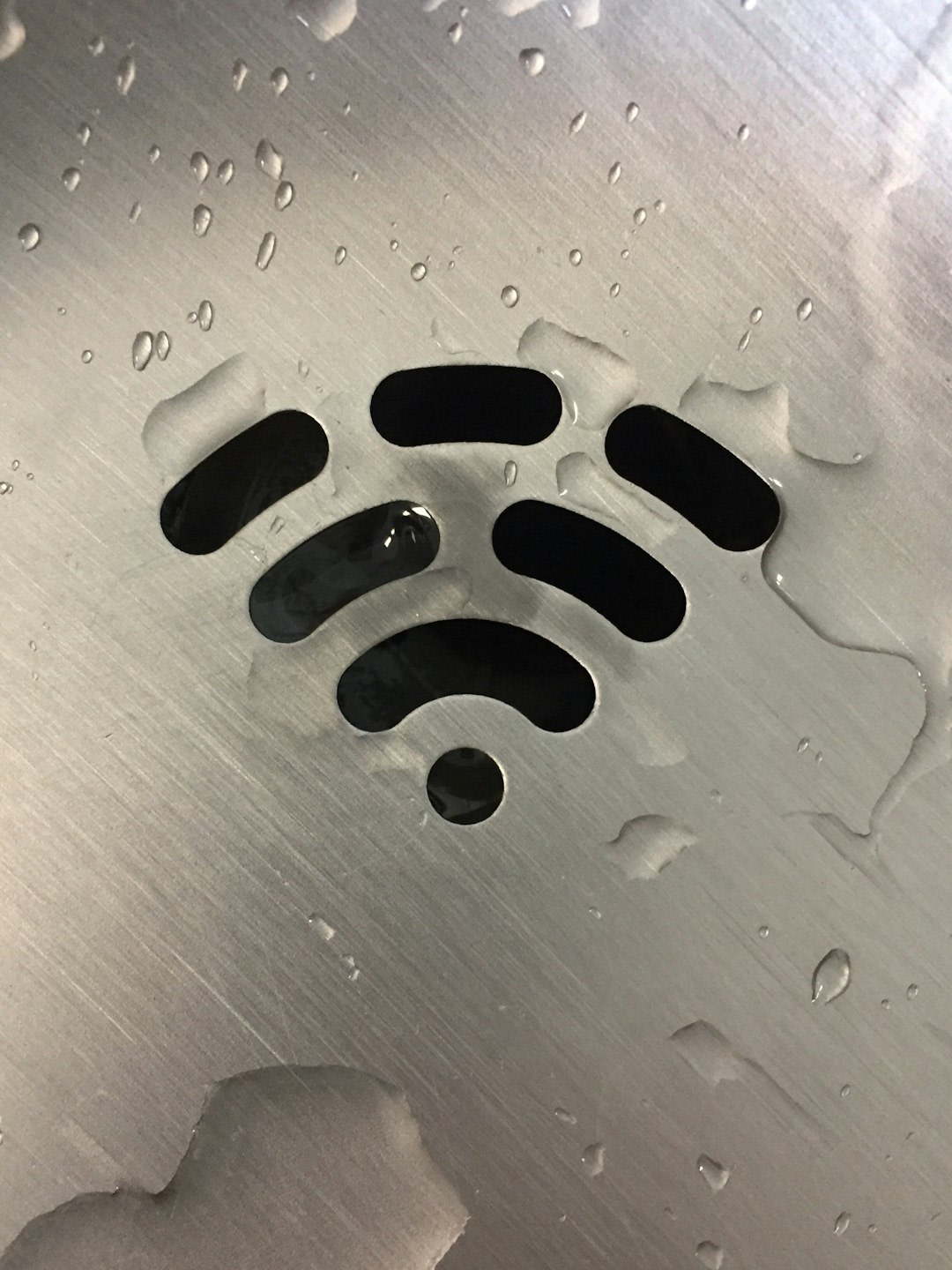 Photo by Jadon Kelly wifi signal on metallic panel